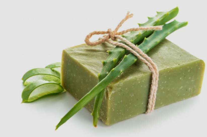 Green aloe vera soap bar with aloe leaves